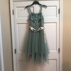 Girls dress. Teal. From Macys. Size 14. Satin under slip. Light beading.